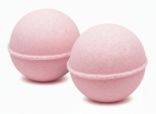 AALIS Etheria Bath Bomb Passion Veil resting beside a bathtub.