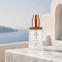 AALIS Dayana Moisturizing Serum bottle on a white marble surface.